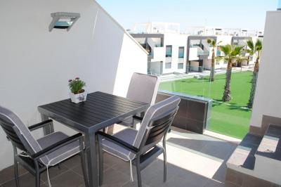 Top floor apartment in Oasis Beach Punta Prima 7 Nº 018 in España Casas