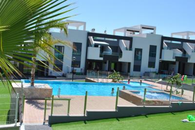 Apartamento en planta baja en Oasis Beach Punta Prima 8 Nº 039 in España Casas